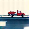 Camion transportant une voiture sur autoroute